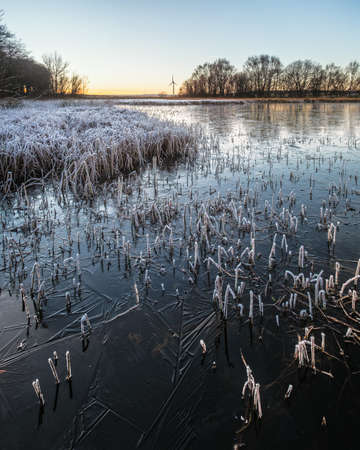 Winter lake covered with ice. January 2019. West Lothian, Scotlandの写真素材