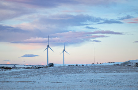 Windmills in a field in winter. West Lothian, Scotland, UK