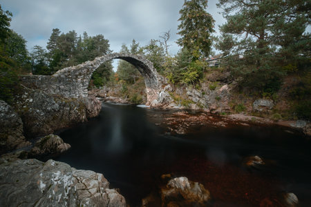 Carrbridge Packhorse Bridge. The old packhorse bridge across the River Dulnain at Carrbridge. Scotlandの写真素材
