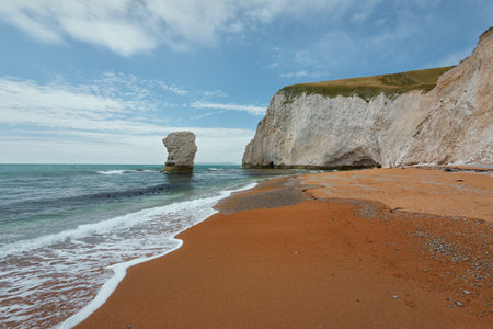 A chalk headland and beach on the Dorset coast in southern England, located between Swyre Head and...