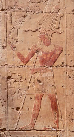 Closeup on ancient hieroglyphs in egyptian temple