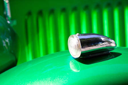 Closeup on turn signal of old shiny vintage carの写真素材