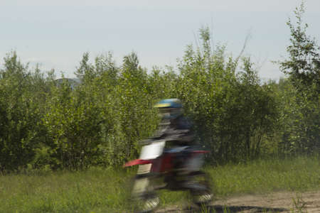 Young athletes train on motodrome sports bikes.の写真素材