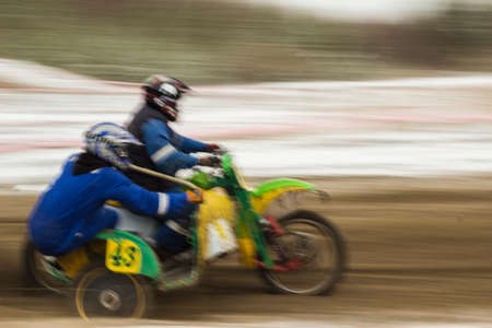 Circuit race on a motorcycle with a sidecar.の写真素材