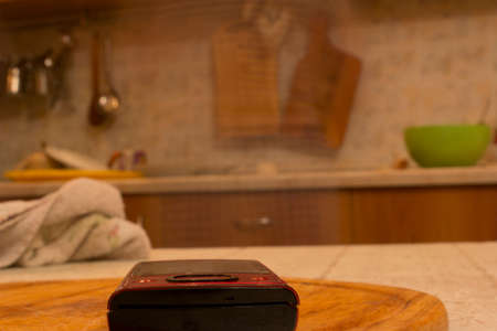 A mobile phone with a blurred background.の写真素材