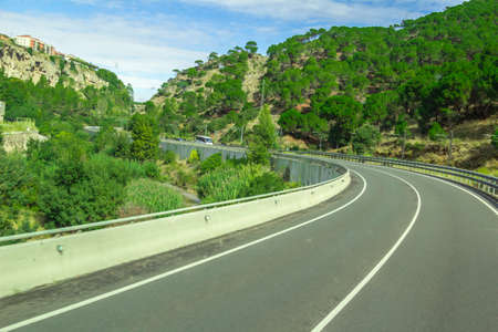 Spain Catalonia Barcelona suburb road to the mountain of Montserrat .