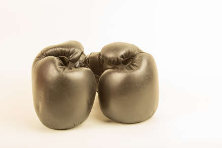 Boxing gloves laid out on a white backgroundの写真素材