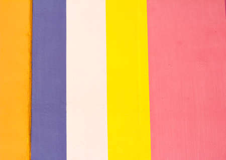 Background in the form of vertical stripes on a white wallの写真素材