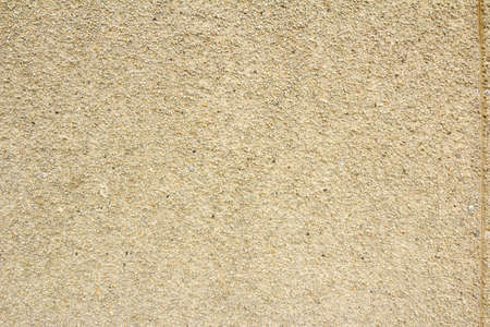 Background in the form of crushed stone brown wallの写真素材