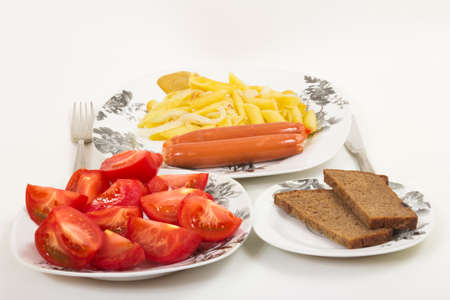 The food laid out on a glass plate on a white backgroundの写真素材
