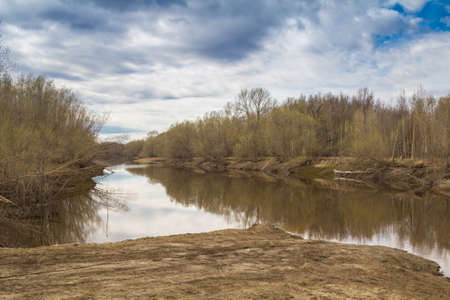 On the banks of the river in early springの写真素材