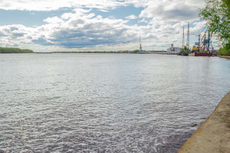 Detail of the shore of the river stretching into the distance of the riverの写真素材