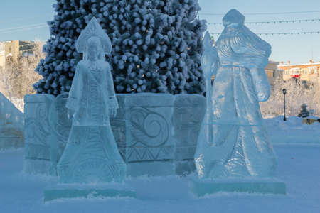 City beautiful tree decorated with tinsel and toysの写真素材