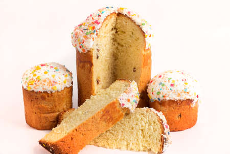 Cut cake of pastry on a white background