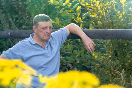 Emotional portrait of a man in natureの写真素材