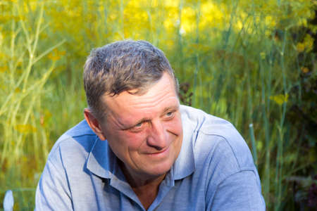 Emotional portrait of a man in natureの写真素材