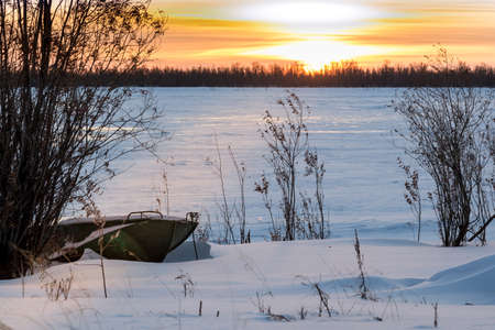The boat under the snowの写真素材