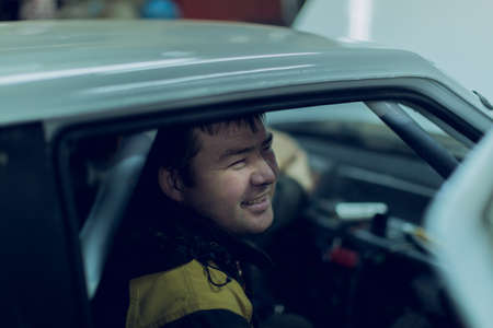 Car master performs urgent order for car repairの写真素材