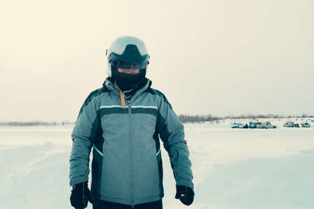 Pilot sports car in full gear and a special racing helmetの写真素材