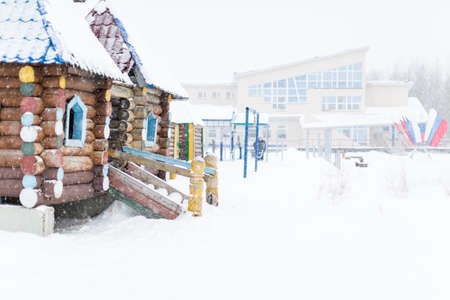 A small sports town filled up with white fluffy snow