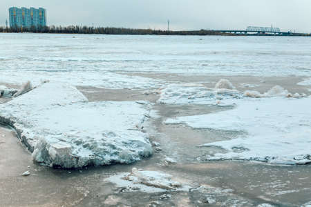 The city located on the other bank of the river preparing for ice