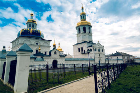 The general plan of the Temple is white with gilded domes