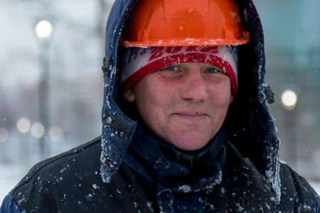 Portrait of a worker engaged in arranging an ice town