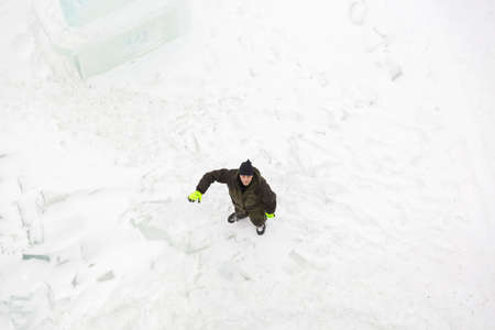 Portrait of a worker on the territory of the ice town looking upの写真素材