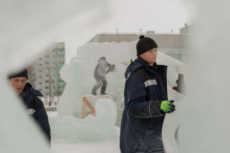 Portrait of a worker engaged in arranging an ice townの写真素材