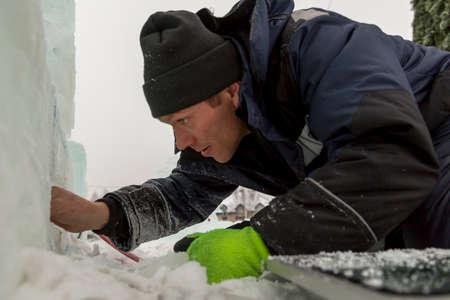 Electrician checks the health of the LED cable to illuminate the ice figures