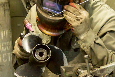 Welding a large car radiator with a gas torch