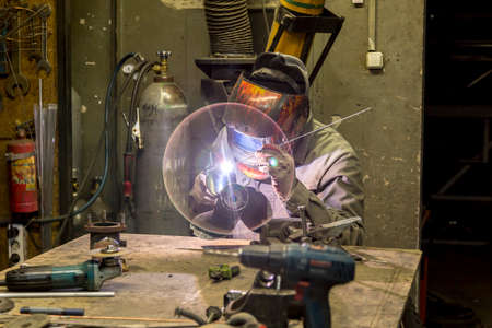 Welding a large car radiator with a gas torch