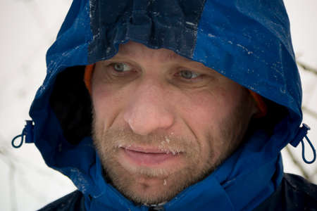 The artist draws the contours of the future ice figure on the ice