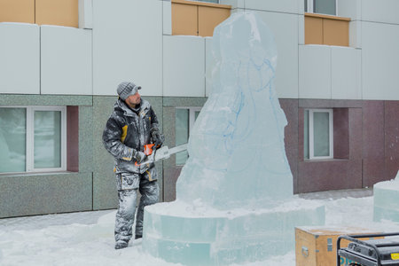 The artist draws the contours of the future ice figure on the iceの写真素材
