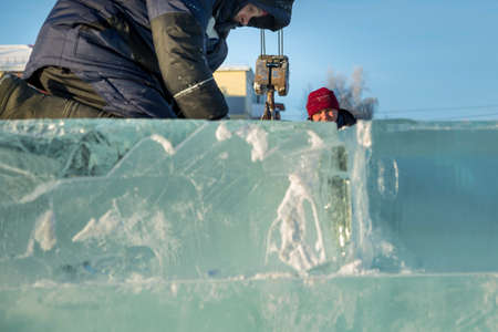 Mounters at the ice block at the assembly site