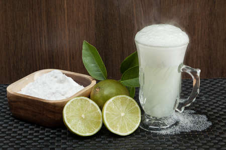 Baking soda - sodium bicarbonate, hot water and lemon.の写真素材