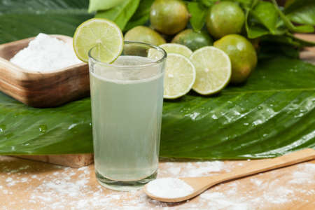 Baking soda - sodium bicarbonate, Water and lemon.の写真素材