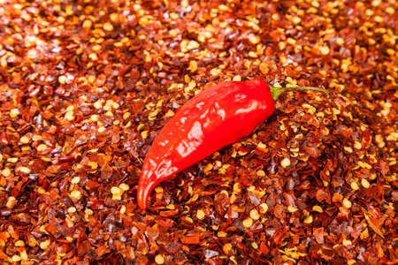 Red pepper or cayenne; Pepper crushed with flakes scattered.の写真素材