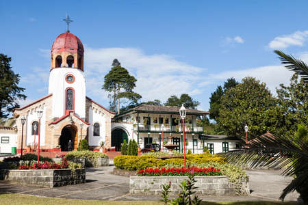Colonial architecture; park with a catholic church in the center.