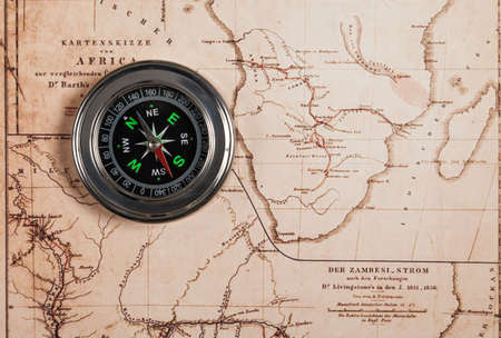 Compass on the vintage map; Adventure background.の写真素材