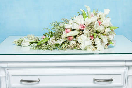 Bouquet of flowers on the nightstandの写真素材