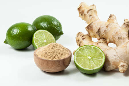 Ginger and lemons root; photo on neutral background.