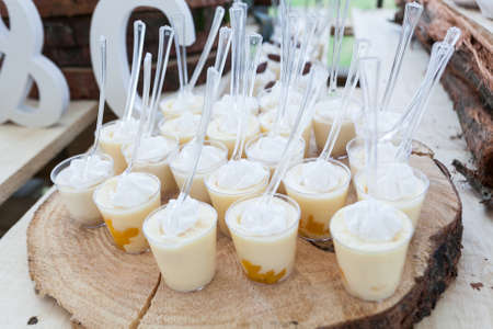 Tasty Creamy Mini Desserts In Cups Ready For Guests At The Wedding Reception.の写真素材
