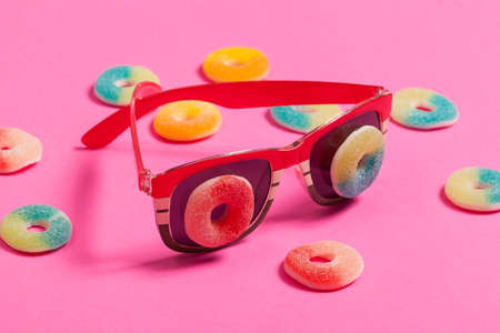 Funny Photo; Eyeglasses With Jelly Beans On The Lenses.の写真素材