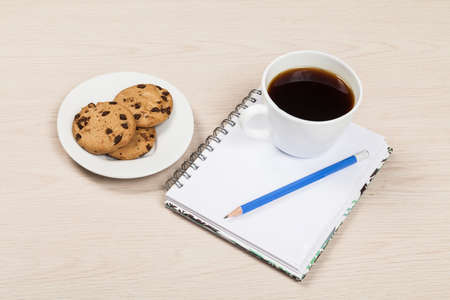 Cookies, Coffee, Notepad, And Pen; Photo On Wooden Background.の写真素材