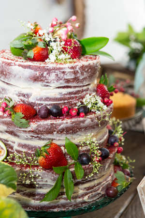 Tasty cake decorated for birthday, anniversary or wedding party.