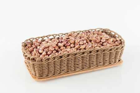 Pinto beans, a legume native to the American continent; photo on white background.の写真素材