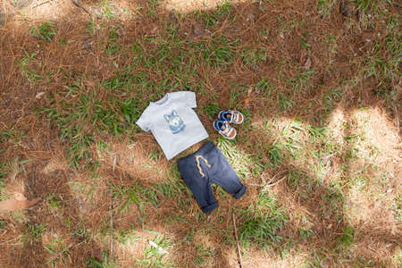 Set of clothes for babies; photos on natural background.の写真素材