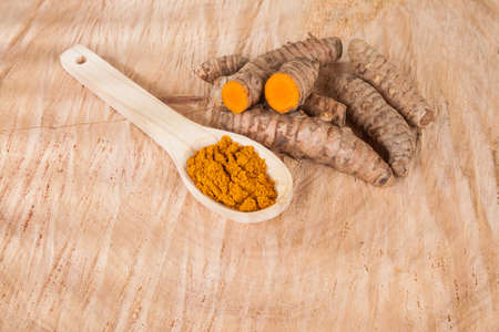 Turmeric - Curcuma longa root and turmeric powder for alternative medicine.の写真素材