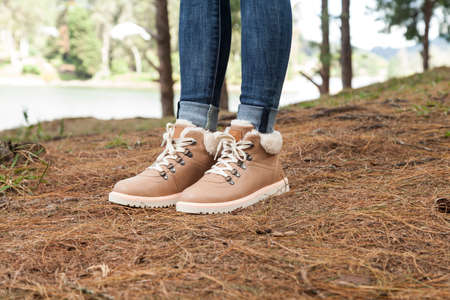 Fashionable women's clothing - beautiful shoes with ankle boots for women; photo on a natural...